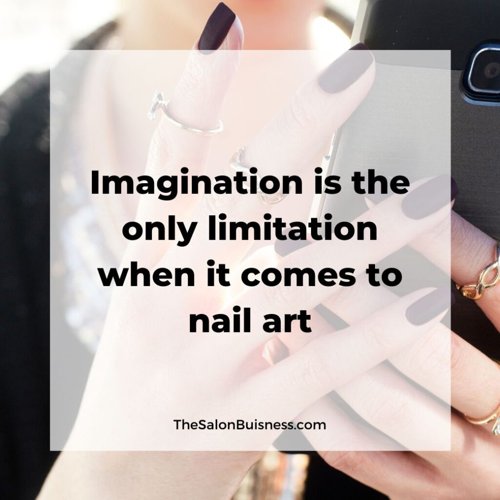 Nail art imagination quote - woman holding phone with dark nails