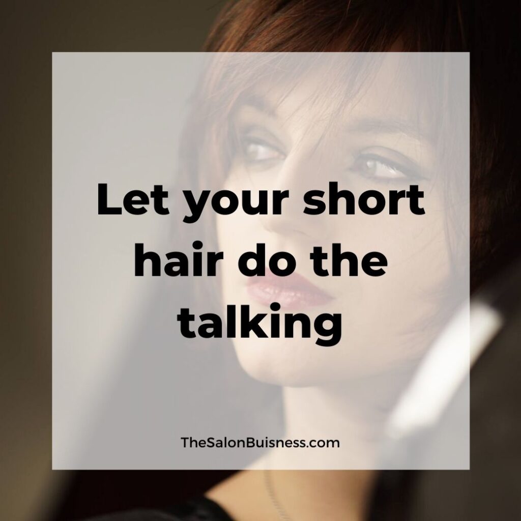 short hair quotes  - woman with short red hair dark eye makeup & red lipstick 